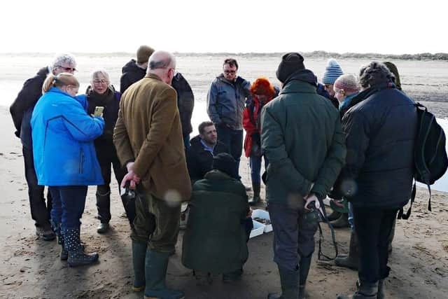 Dr Jack Sewell of the Marine Biology Association, looking at the biodiversity of the beach north of Mablethorpe with the Bell Beach Biology citizen science group.