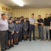 Andrew Lyle and Richard Cameron from the Round Table present the cheque to Flt Lt Mike Eckersley RAFAC, OC 2292 (Market Rasen) Sqn