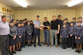 Andrew Lyle and Richard Cameron from the Round Table present the cheque to Flt Lt Mike Eckersley RAFAC, OC 2292 (Market Rasen) Sqn