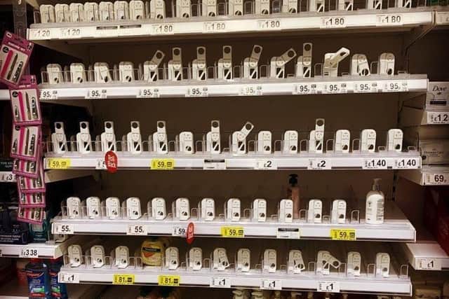 Empty hand sanitizer shelves at Boston Asda over the weekend