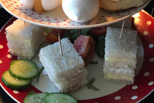Cut sandwiches into neat squares for afternoon tea.