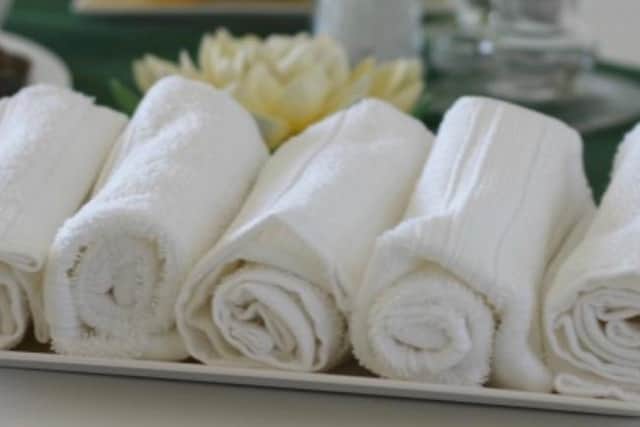 Warm cloths in vegetable steamer.