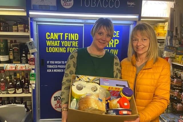 Charly Clarke and Dawn Harrison of the Spa  in Burgh le Marsh with a delivery ready to go out to members of the community unable to visit the shop.
