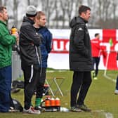 Jamie Shaw (second from right) welcomed the revenue from Saturday's match, but questioned the decision to play on EMN-200317-090423002