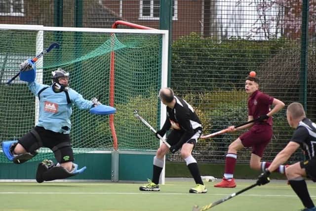 Thomas Pinchbeck in the goalmouth action EMN-200316-171829002