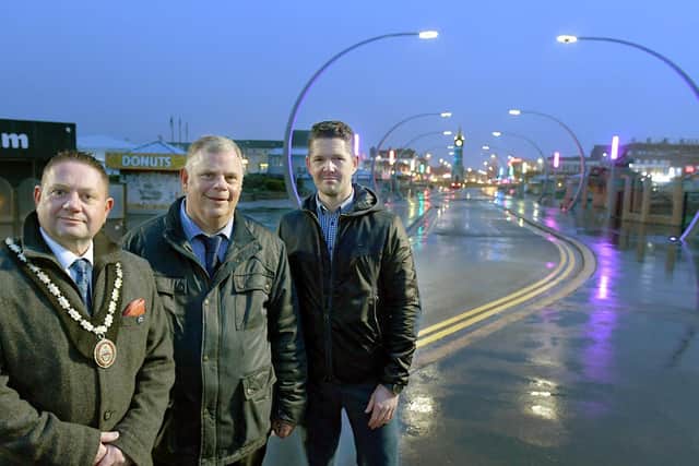 Mayor of Skegness Coun Mark Dannatt, Coun Steve Kirk, ELDC's Portfolio Holder for Coastal Economy, and Sam Robbins, senior technical officer for ELDC at the launch of the new lighting in Tower Esplanade.