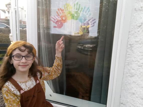 Children in Skegness have been painting rainbows to spread a message of hope. Here is Erin Sherwood with her picture.