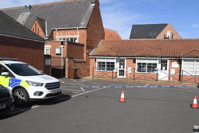 The police cordon in White Hart Mews. EMN-200323-112515001