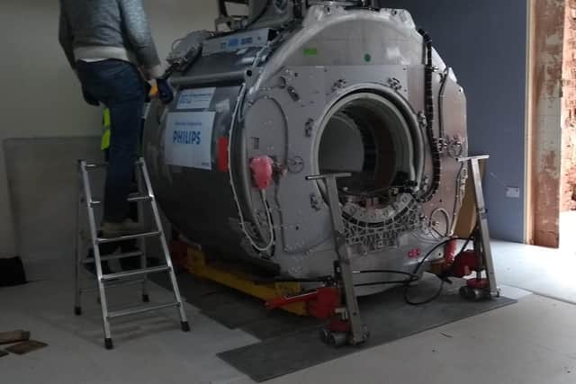 The giant MRI magnet was carefully lowered into the suite by a crane.