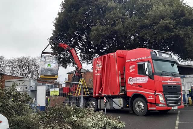 The giant MRI magnet was carefully lowered into the suite by a crane.