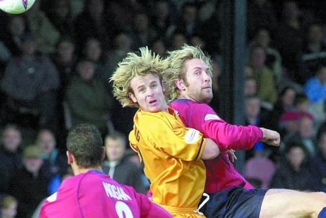 Battling with Jon Parkin at York, his former club.