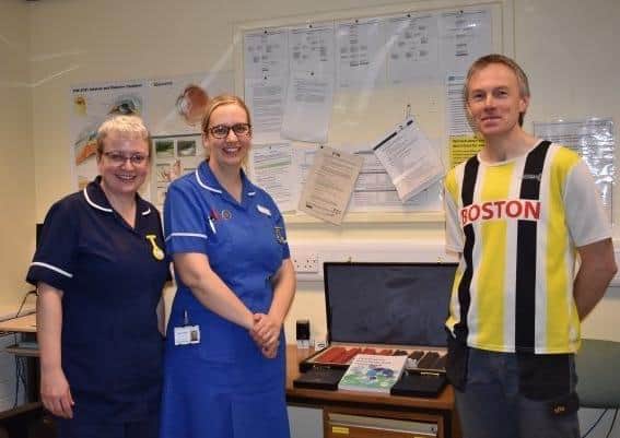 Fundraiser John Burton during a visit to Pilgrim Hospital.