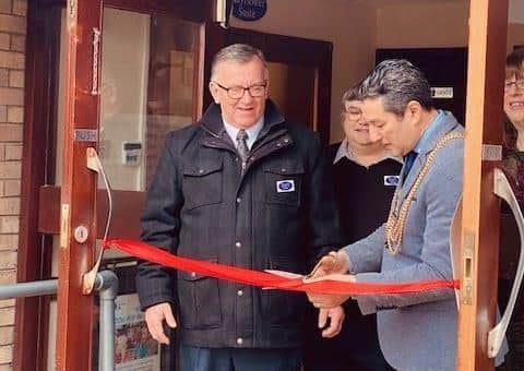 The Mayor of Boston Coun Anton Dani performs the ribbon-cutting duties with chairman Stuart Davidson.