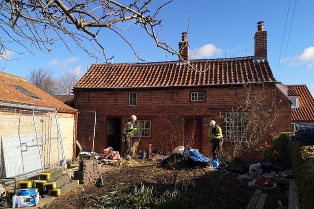 Mrs Smith's Cottage in Navenby, as scaffolding was removed in February. EMN-200330-142531001