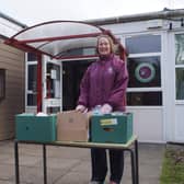Mike May from Market Rasen New Life Church and  teaching assistant Karen Moulding with some of the boxes EMN-200330-170203001