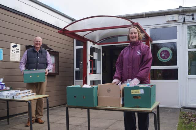 Mike May from Market Rasen New Life Church and teaching assistant Karen Moulding with some of the boxes EMN-200330-170203001