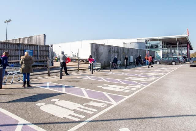 Shoppers in Skegness at Tesco respecting social distancing. Photo: John Aron.