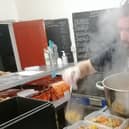 Paul prepares delicious and nutritious meals for people in the community.