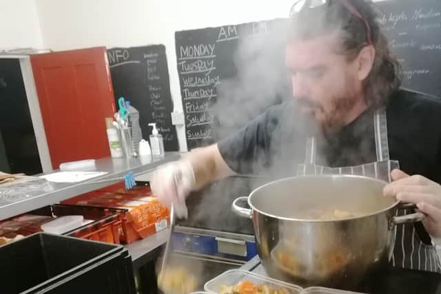 Paul prepares delicious and nutritious meals for people in the community.