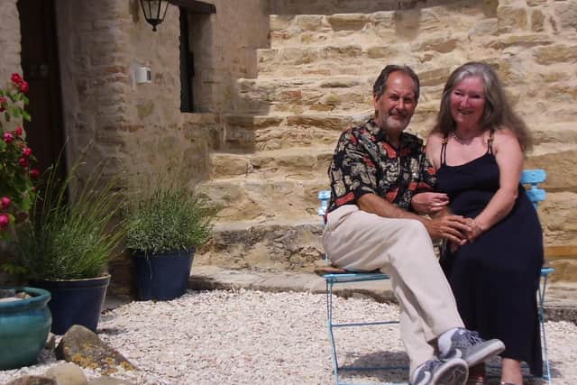 Greg and Sandra Perry outside their B&B business in Italy.