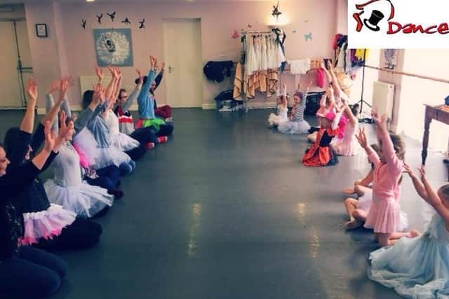 Hands up: Children and parents show off their skills