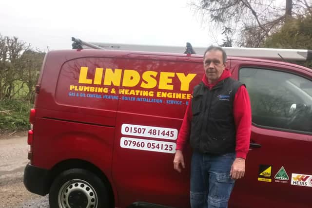 Job done: Dave Darnbrough prepares to head off to his next appointment