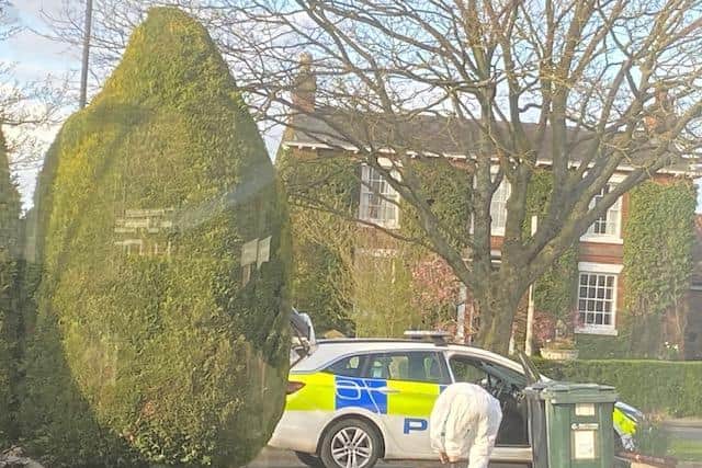 Police changing into forensic suits before a Covid-19 incident was reported in Wainfleet.