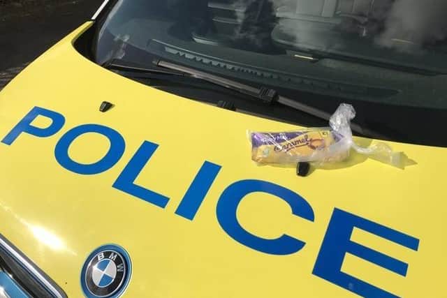 A chocolate gift left on the Sleaford policing team's BMW i3 at Ruskington. EMN-200904-100213001