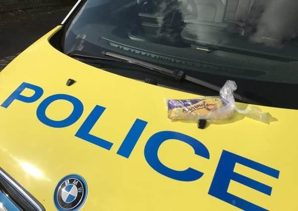 A chocolate gift left on the Sleaford policing team's BMW i3 at Ruskington. EMN-200904-100213001