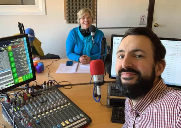 Dylan Taylor, station director at 107 Endeavour FM, with radio presenter Wendy Deamer.
