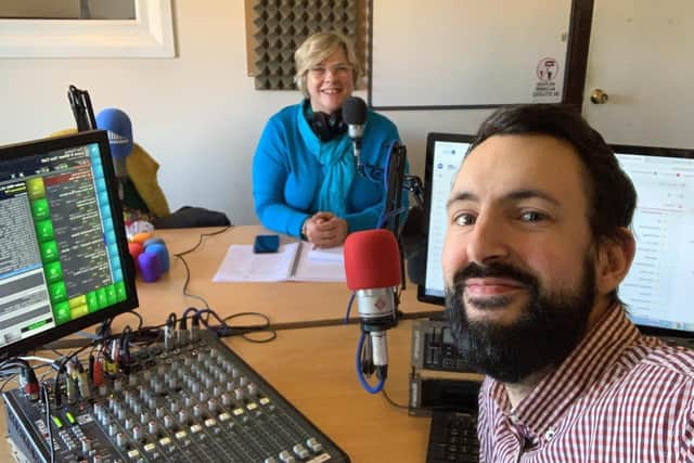 Dylan Taylor, station director at 107 Endeavour FM, with radio presenter Wendy Deamer.