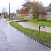 The Digby Beck, overflowing into Beck Street in November 2019 after heavy rain. EMN-200904-171935001