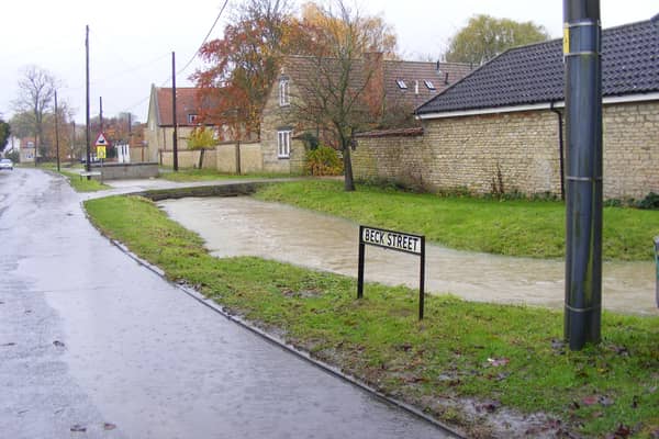 The Digby Beck, overflowing into Beck Street in November 2019 after heavy rain. EMN-200904-171935001