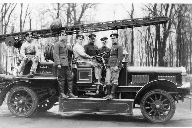 The fire engine and crew of RAF Cranwell West Camp around 1927. EMN-201004-130544001