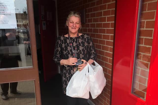 A delivery of fish and chips for the homeless is received by Witham Lodge in Skegness.