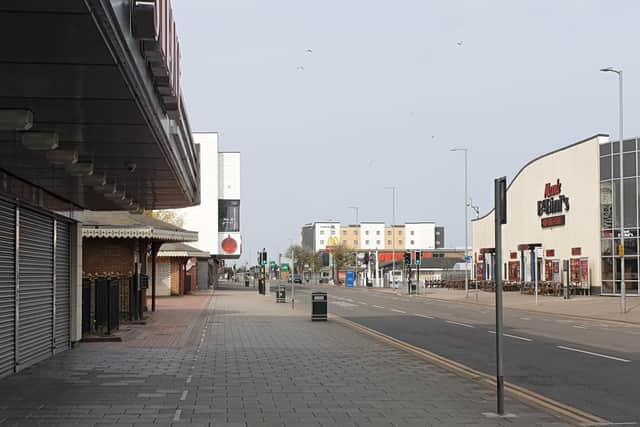 A deserted Grand Parade on Easter Saturday. Last year the resort was bustling with people enjoying record temperatures. Photo: James Hardaker.