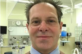 Dr Matthew Dolling.