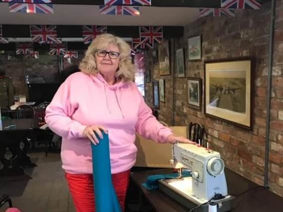 Jane  Simpson cutting scrubs at the Village Church Farm Museum in Skegness.