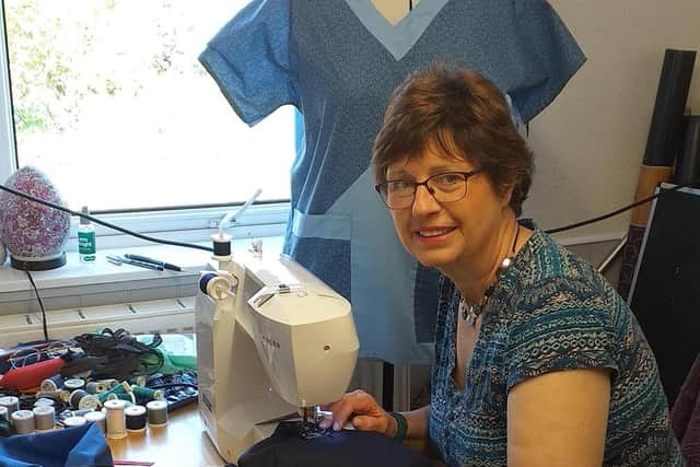Wendy Cresswell sewing scrubs.