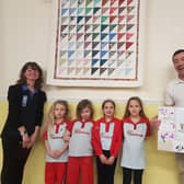 Leader Elle Goodacre with Burgh Rainbows and Coun Jimmy Brookes.