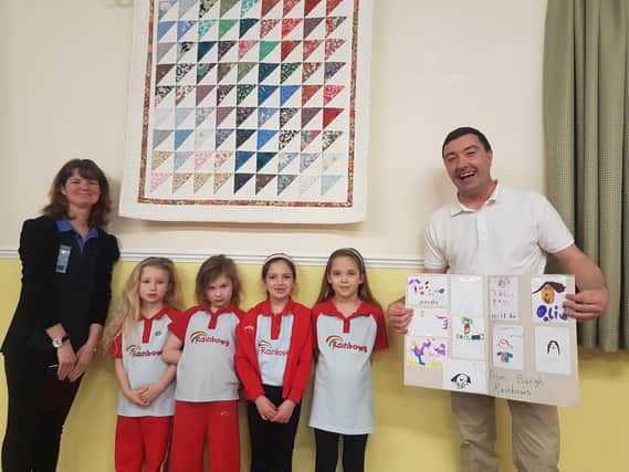 Leader Elle Goodacre with Burgh Rainbows and Coun Jimmy Brookes.
