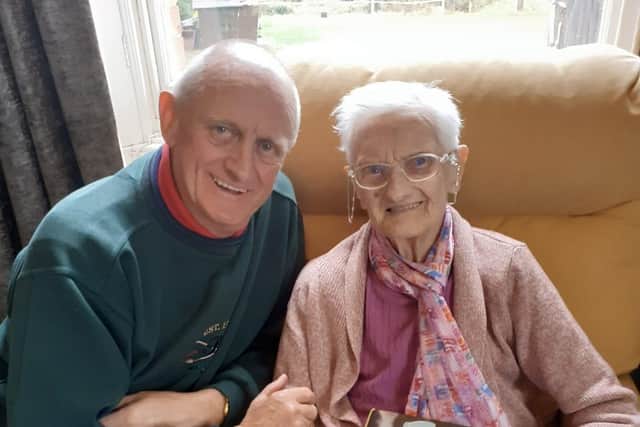 Mary with son John Epton and (just out of view) her card from the Queen.