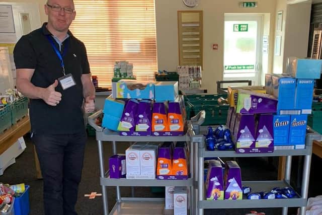 Rod Munro of Sleaford Community Larder welcomes his delivery.
