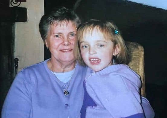 Emily with her gran when she was younger. EMN-200422-124105001