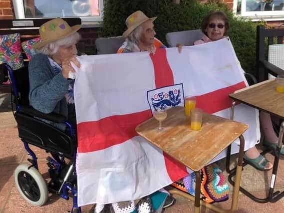 Residents at Syne Hills Residential Home celebrating St George's Day.