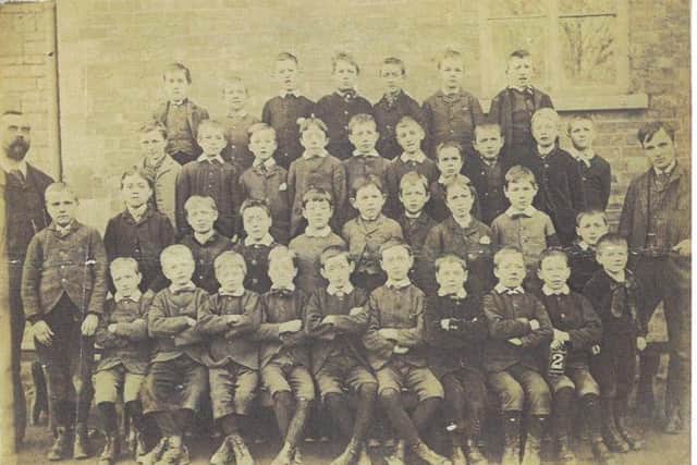 An old photo of William Alvey School from the days of slates. EMN-200414-095515001