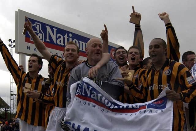 Celebrating the 2002 Conference win.