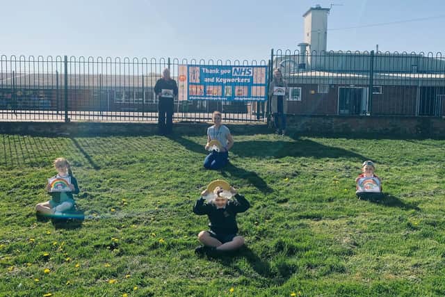 LaceyField pupils show off their artwork.
