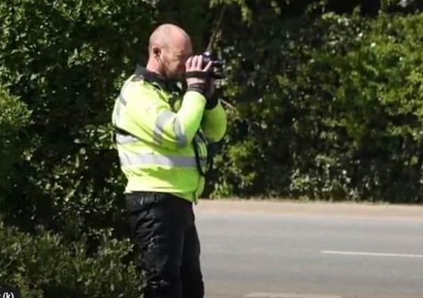 Pc Pete Wing conducting speed checks. EMN-200426-111308001
