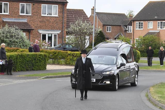 An emotional funeral procession begins for Jeannette Field, watched by neighbours in Skegness.